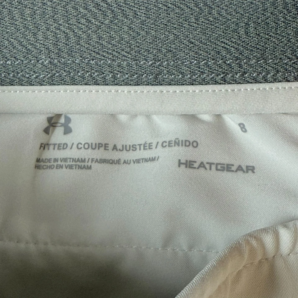 Pantalones cortos de golf Under Armour ajustados HeatGear chinos para mujer 8 blancos rendimiento 4" Foto 4 de 4