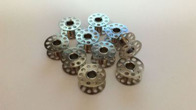 10 Spulen aus Metall für Quasatron Nähmaschinen