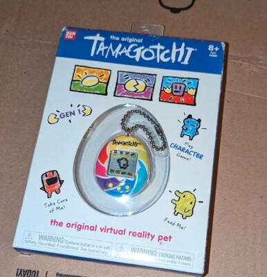 NEW in BOX, GEN 1 TAMAGOTCHI EGG VIRTUAL REALITY PET, RAINBOW