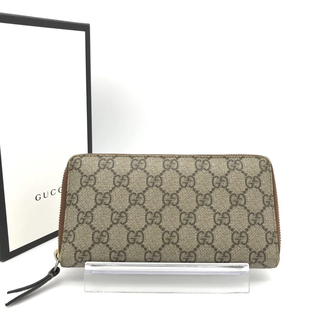Portefeuille long Gucci GG Supreme en cuir marron, fabriqué en Italie, d'occasion