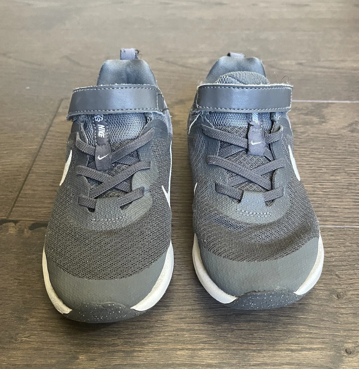 Nike revolution deals kids trainers