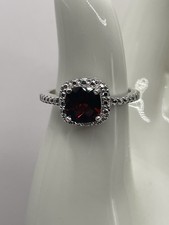 Sterling silver garnet with halo ring. Size 8 925 3.18grams Total