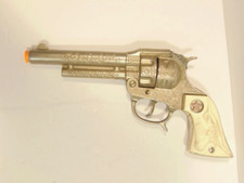 Vintage Texan Jr. toy cap gun; longhorn steers on handle grips