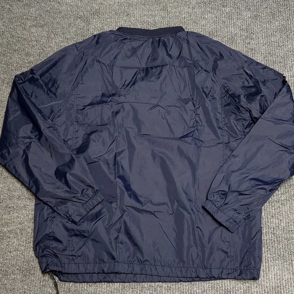 Cortavientos Clique Para Hombres Grande Cuello en V Azul Bolsillos Golf Impermeable Rendimiento Foto 4 de 4