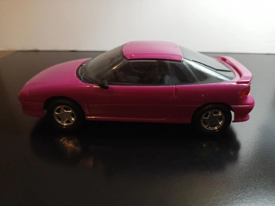 1/25 AMT ERTL 1993 CHEVROLET GEO STORM MYSTIC MAGENTA PROMO - Image 2 of 4