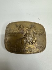 Vintage 1975 Smith  Wesson "The Hostiles" Cowboy Riding Horse Brass Belt Buckle