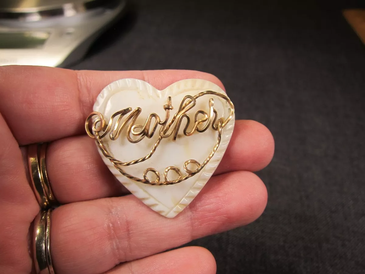Mother brooch on sale