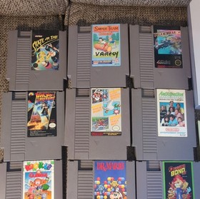 Nintendo Entertainment System Console Lot w/ Zapper, Games (Mario, Zelda, Bond)