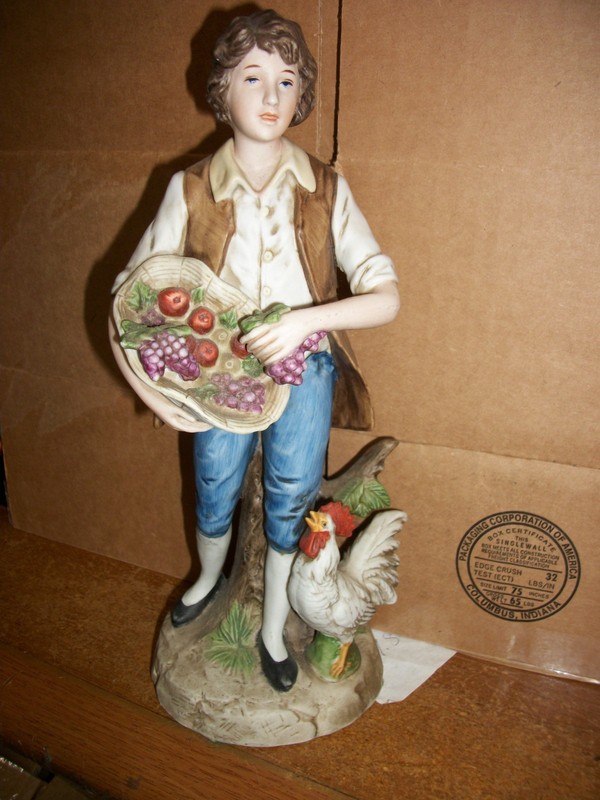 Homco "Farm Boy with Grapes & Rooster" porcelain statue, numbered #1401.
