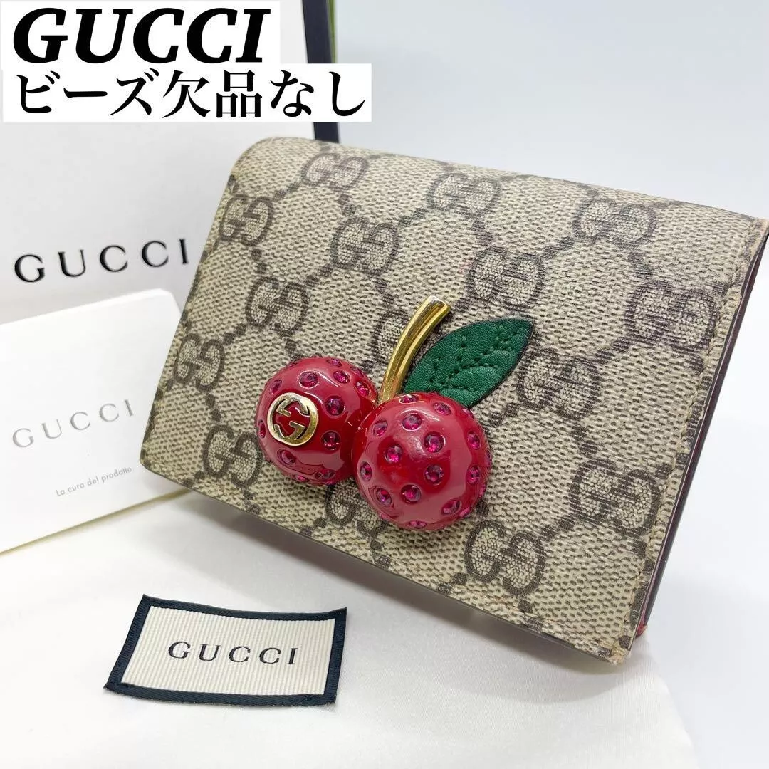 Portefeuille bi pli Gucci GG Supreme Cherry cuir marron
