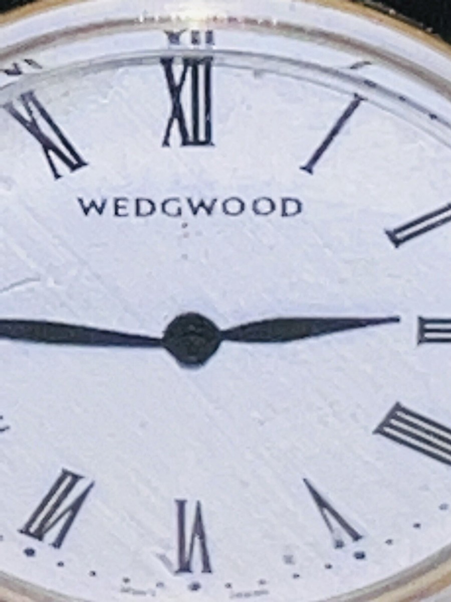 Wedgwood bone china mantle clock adorned with wild strawberry