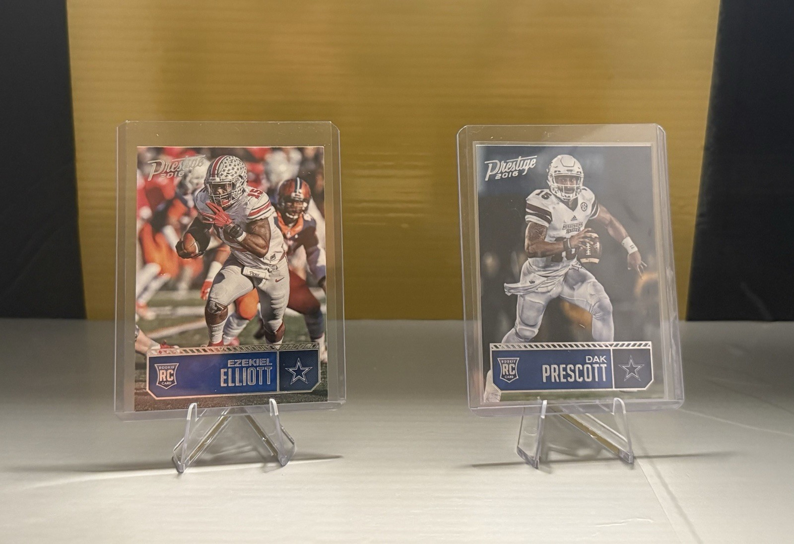 2016 Panini Prestige Dak Prescott (RC). # 206 & Ezekiel Elliott # 217 (RC)