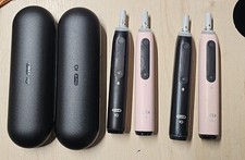 Image of Oral-B iO5 4x Electric Toothbrushes 5 Modes Black & Pink For Adults w/ Case