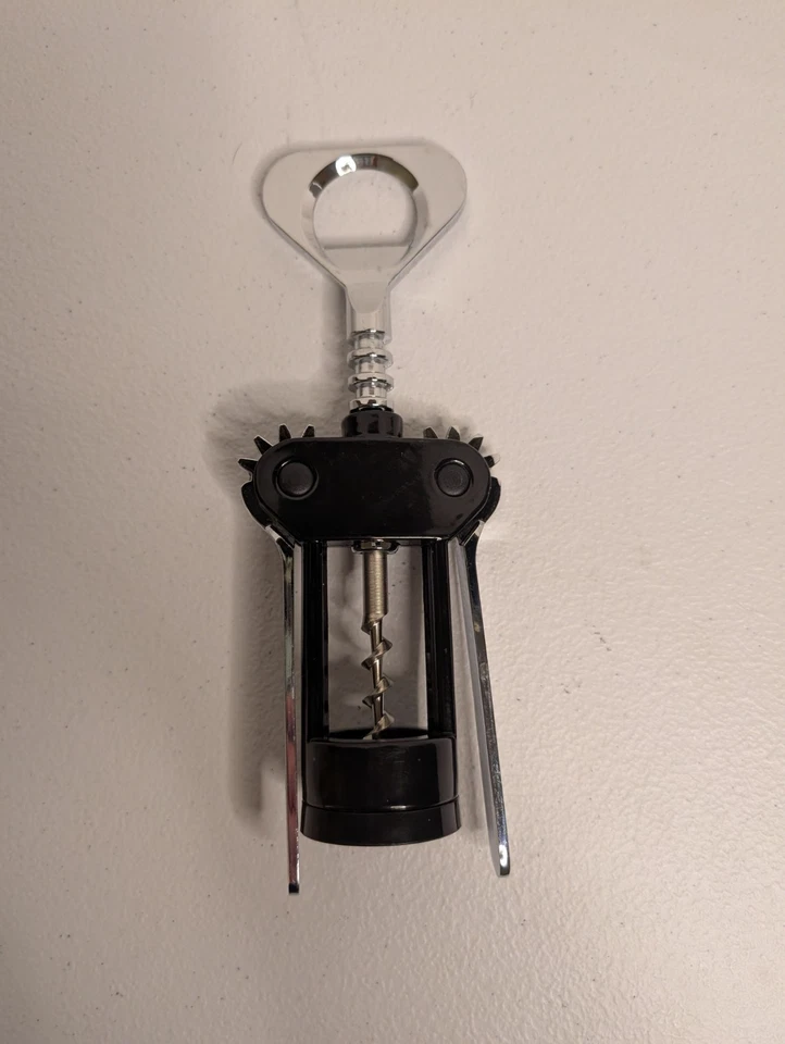 Abridor de botellas de vino sacacorchos Swing Away esmalte negro acero inoxidable Italia DE COLECCIÓN Foto 2 de 3