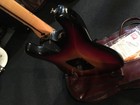 No.013624 TOKAI TSS-38 3TS/R Japan Vintages Mint, back view with gold hardware and brown leather fretboard.