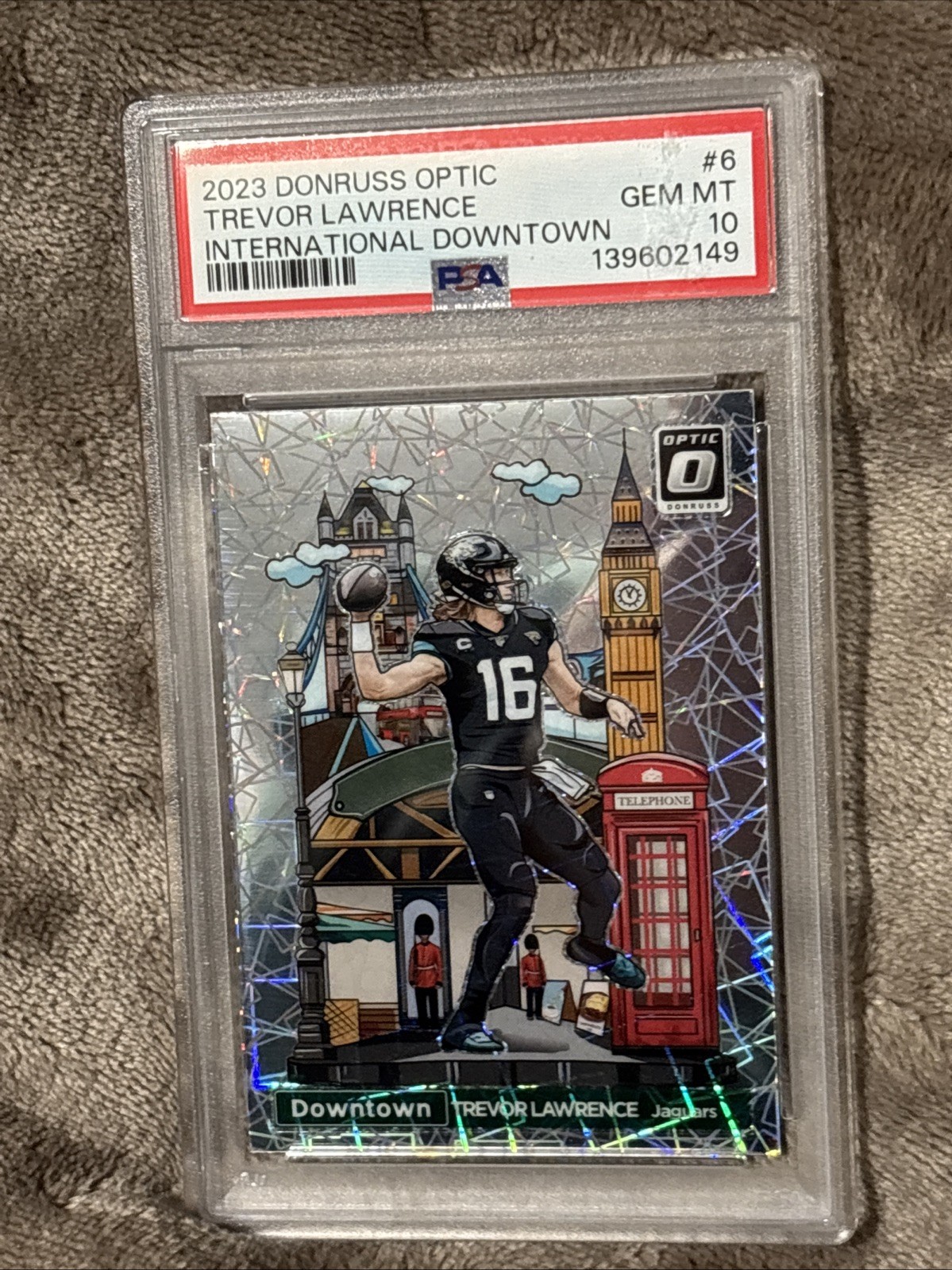 TREVOR LAWRENCE INTERNATIONAL DOWNTOWN 2023 Panini Donruss Optic PSA 10 #6 P-OFF