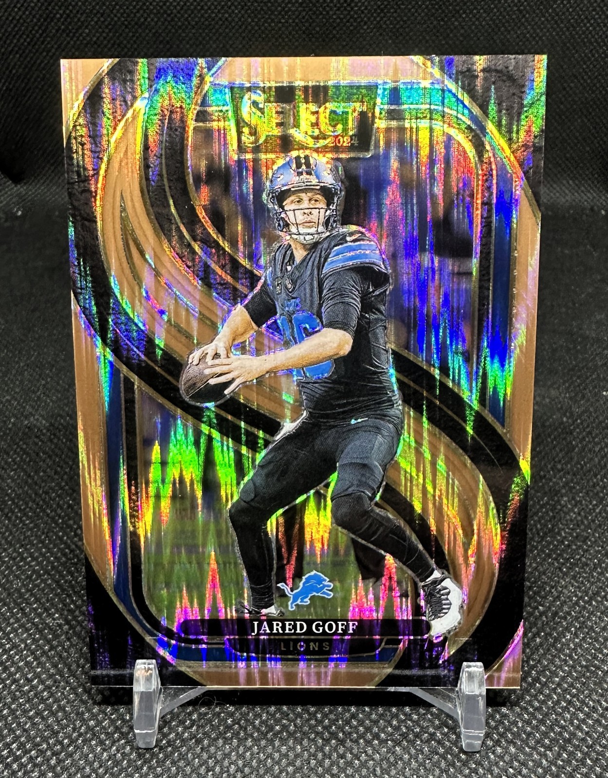 2024 Panini Select Jared Goff Copper Shock Prizm #d/299 Premier Level Lions #123