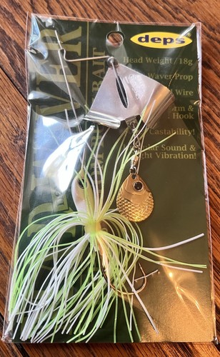 deps new MAD WAVER #10 Dead Grass color 5/8 oz bait in packaging with silver lure and green-white striped lure.