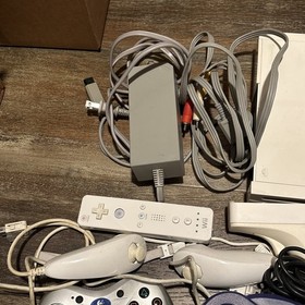 11lb Nintendo Wii & WiiU Console Lot of 2 Black White, 11 Games Cables Remotes