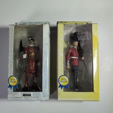 British Palace Coldstream Guardsman and Yeoman Warders Collectible Figures (2)