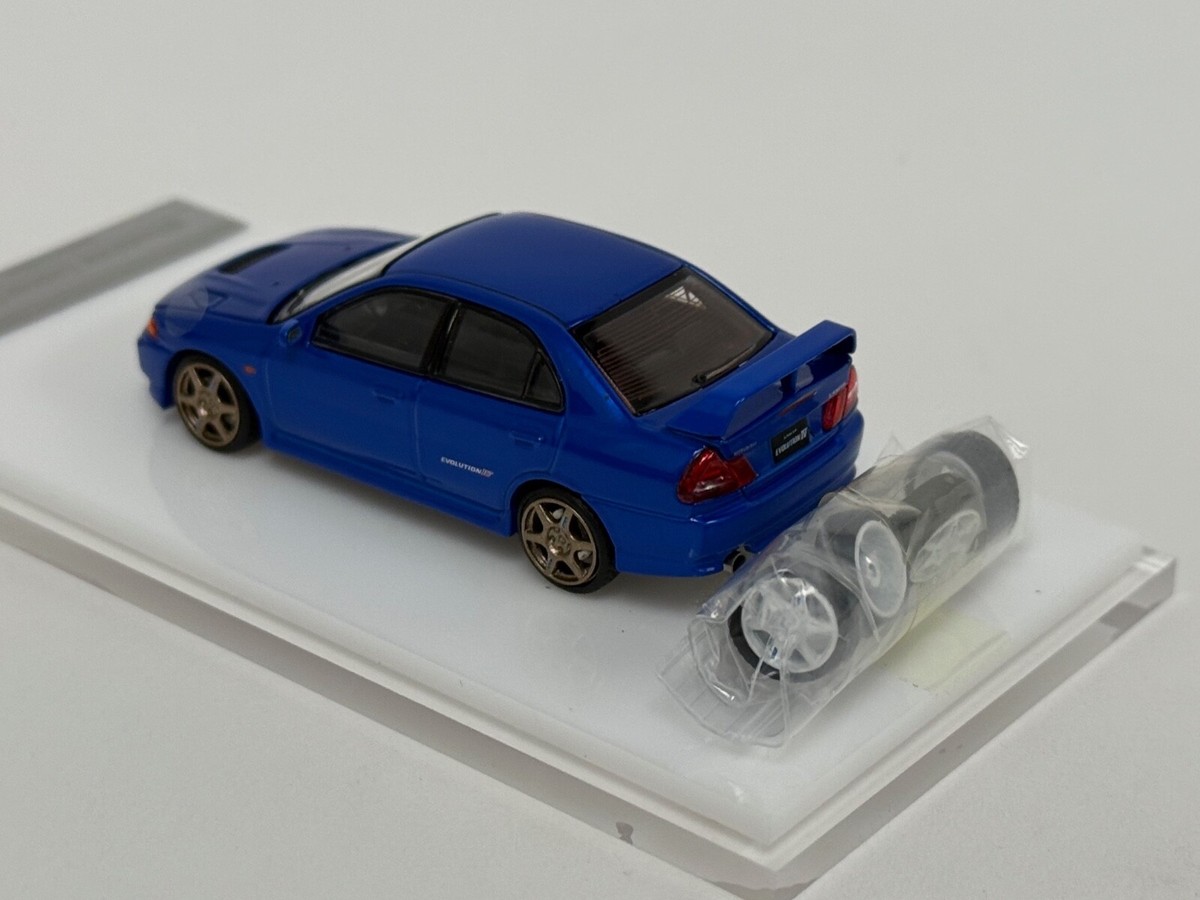 1/64 Motorhelix Mitsubishi Lancer Evolution IV in Blue 64-052 | eBay