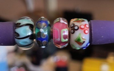 3 Preloved Trollbeads Uniques and 1 Event Barrel