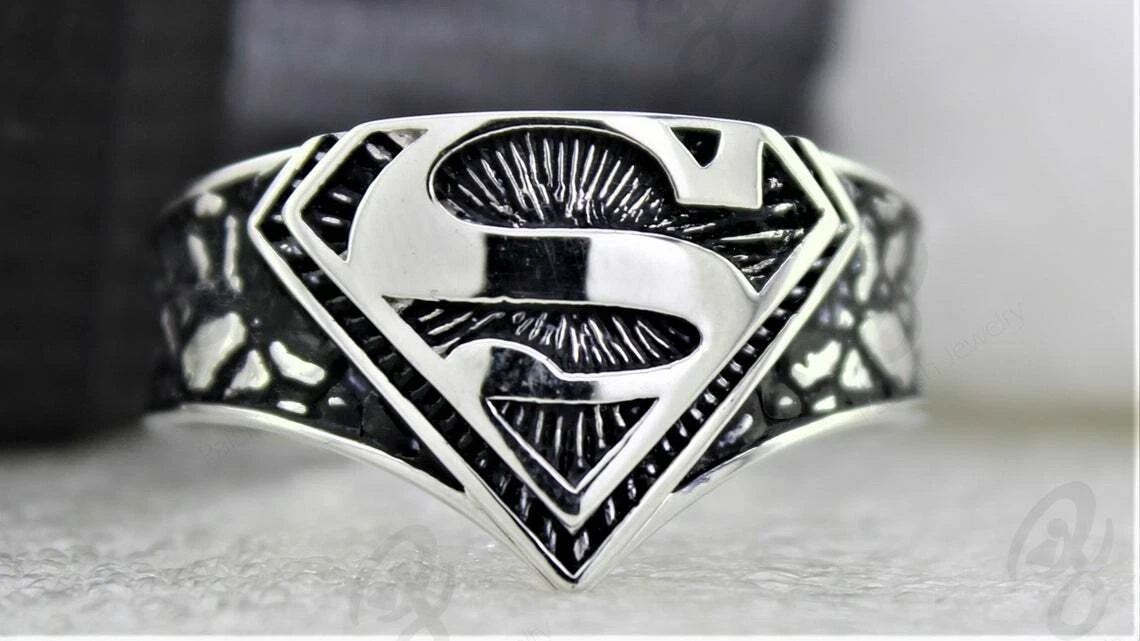 Superman ring best sale silver