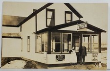 Tarjeta postal RPPC MN John Peterson's Place almuerzo-alojamiento Lovit bebida Q11