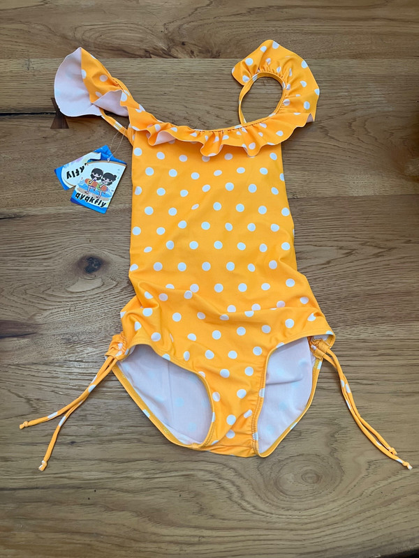 NWT Girls adorable yellow and white polka dot Boutique bathing suit size 8