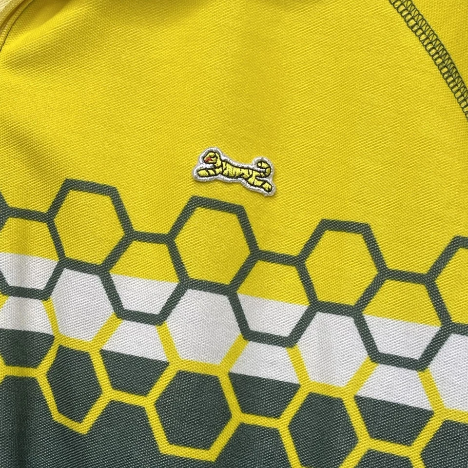 Chaqueta deportiva Le Tigre para hombre con patrón de panal verde amarillo L Foto 2 de 4