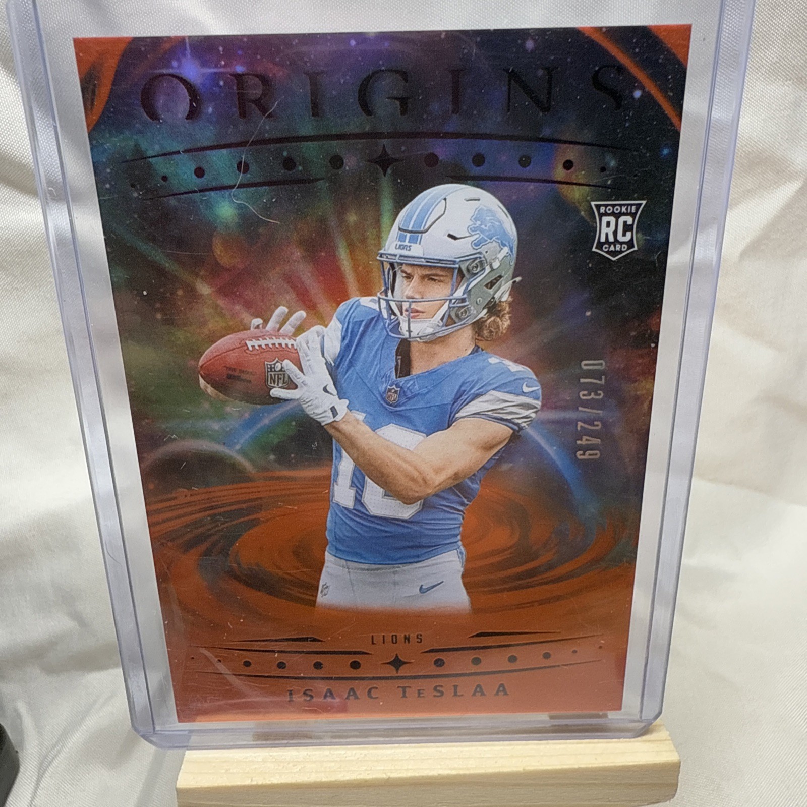 2025 Panini Origins - Rookies Isaac Teslaa #118 Orange /249 (RC) - Lions
