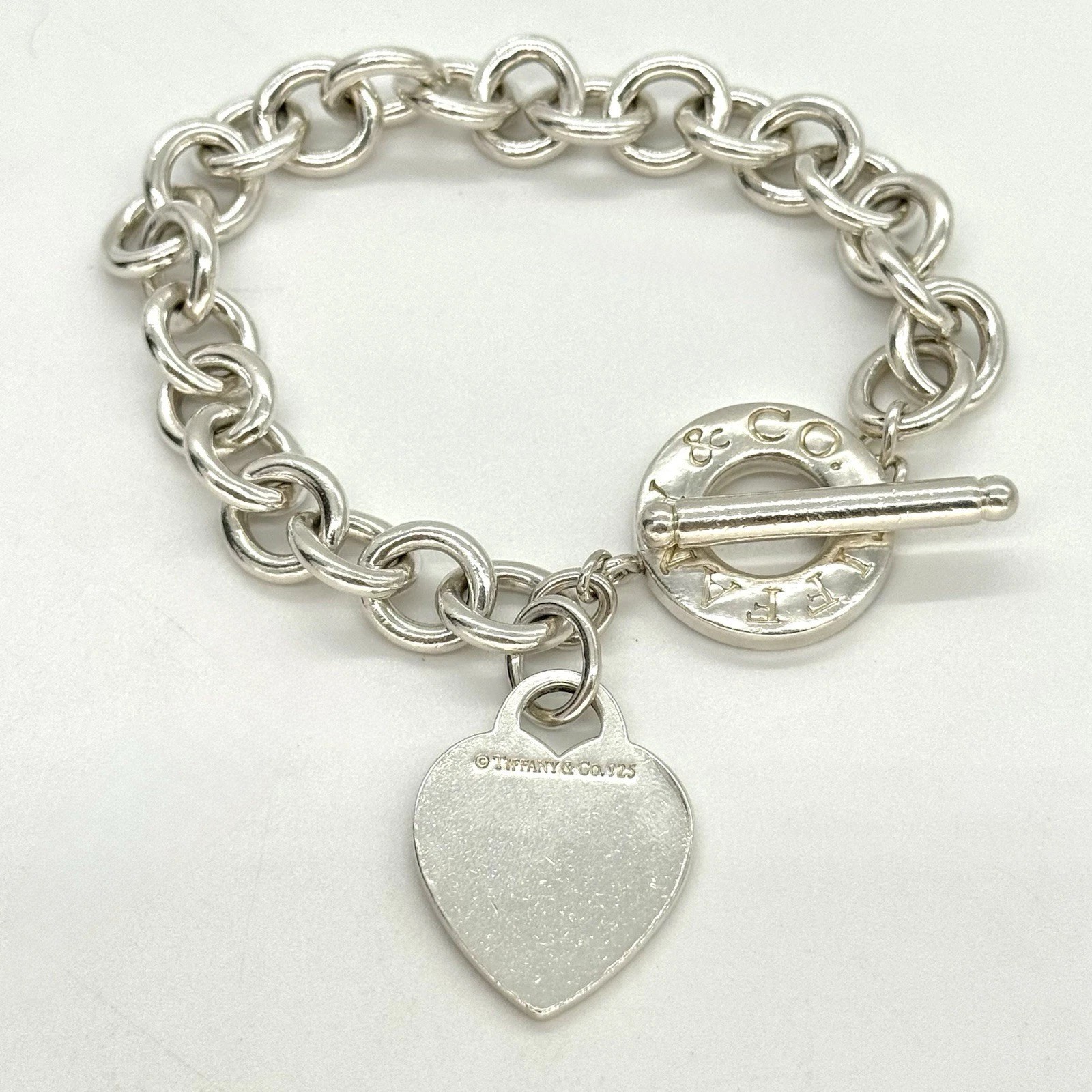 Tiffany & Co. Sterling Silver 10mm Circle Link Heart Charm Toggle Bracelet 7.75”