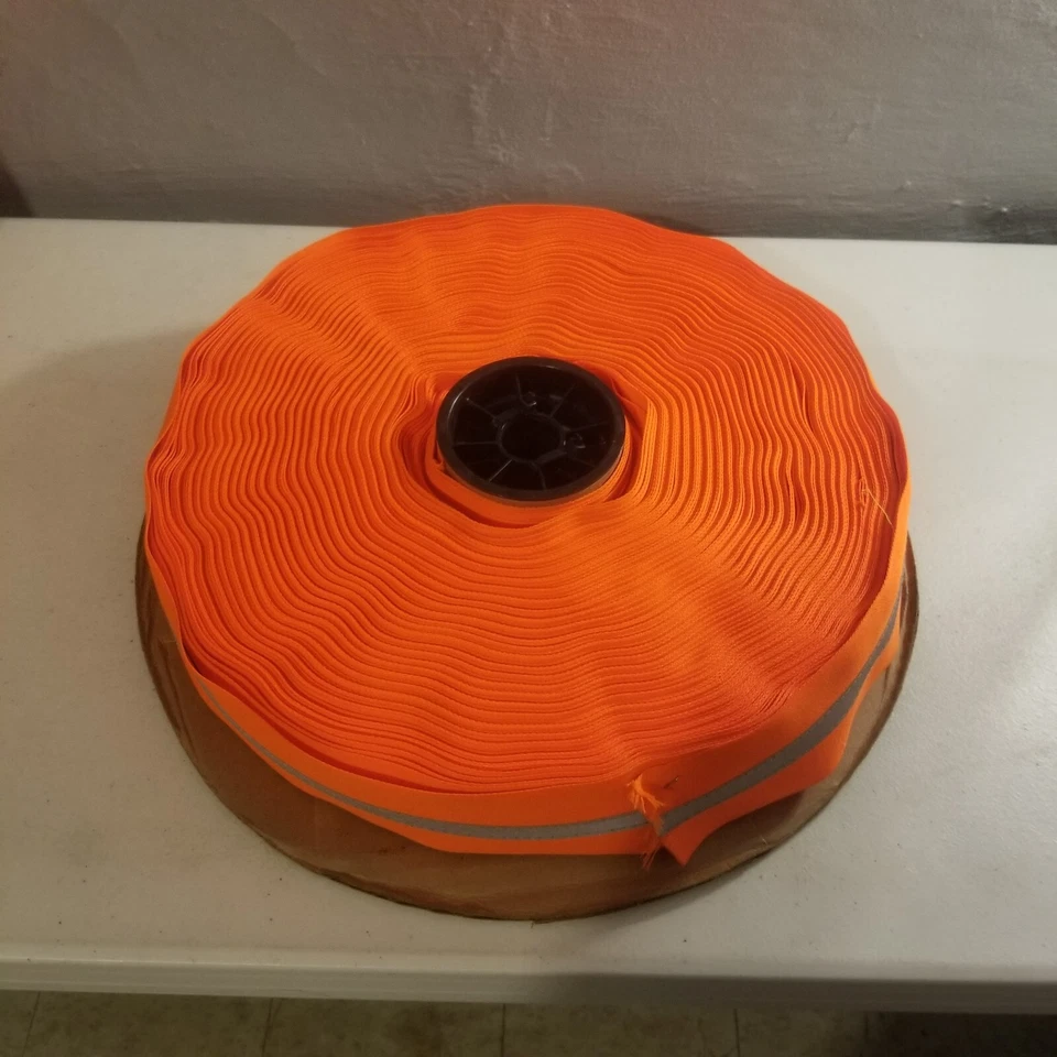 Tela sintética naranja, raya de seguridad plateada coser en tela sintética rollo de 300 pies Foto 2 de 2