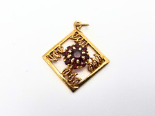 Vintage 9ct gold and garnet cluster pendant, diamond shaped with leaves Hallmark