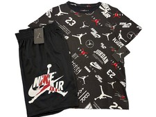 NWT NIKE AIR JORDAN BOY  S 2 PC SET BLACK SHORT SLEEVE BLACK MESH SHORTS L 12-13