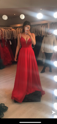 Brand new red prom dress , never worn, can fit sizes 6-10 as has a tie up  back !