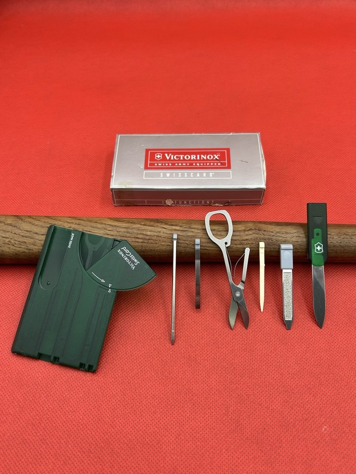 NOS (New Old Stock) Swiss Card in a rare translucent emerald colorway — a flat, wallet-sized 10-function multi-tool that's both a functional EDC legend and a collectible piece of Victorinox history.