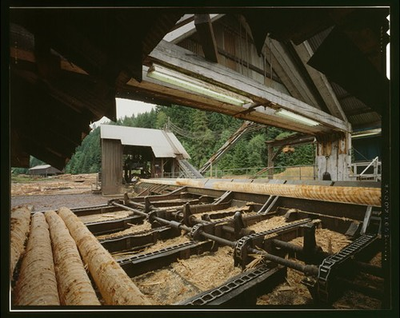 #ad VIEW OF DEBARKER FROM LOG IN FEED DECK. NOTE ROOF SUPPORT OVER CARRIAGE AND LOG $12.99