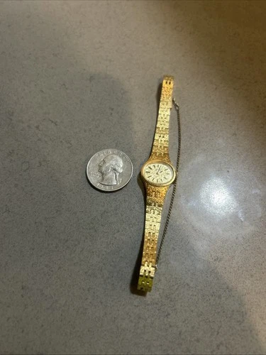 Nice Seiko Watch Women’s 17mm Gold Dial Gold Tone Oval 1400-7389 New Battery