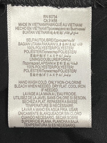 Minifalda BCBGeneration Talla 0 Negra Brillo Corte Láser Ojales Cremallera Trasera Nueva con Etiquetas - Imagen 7 de 10