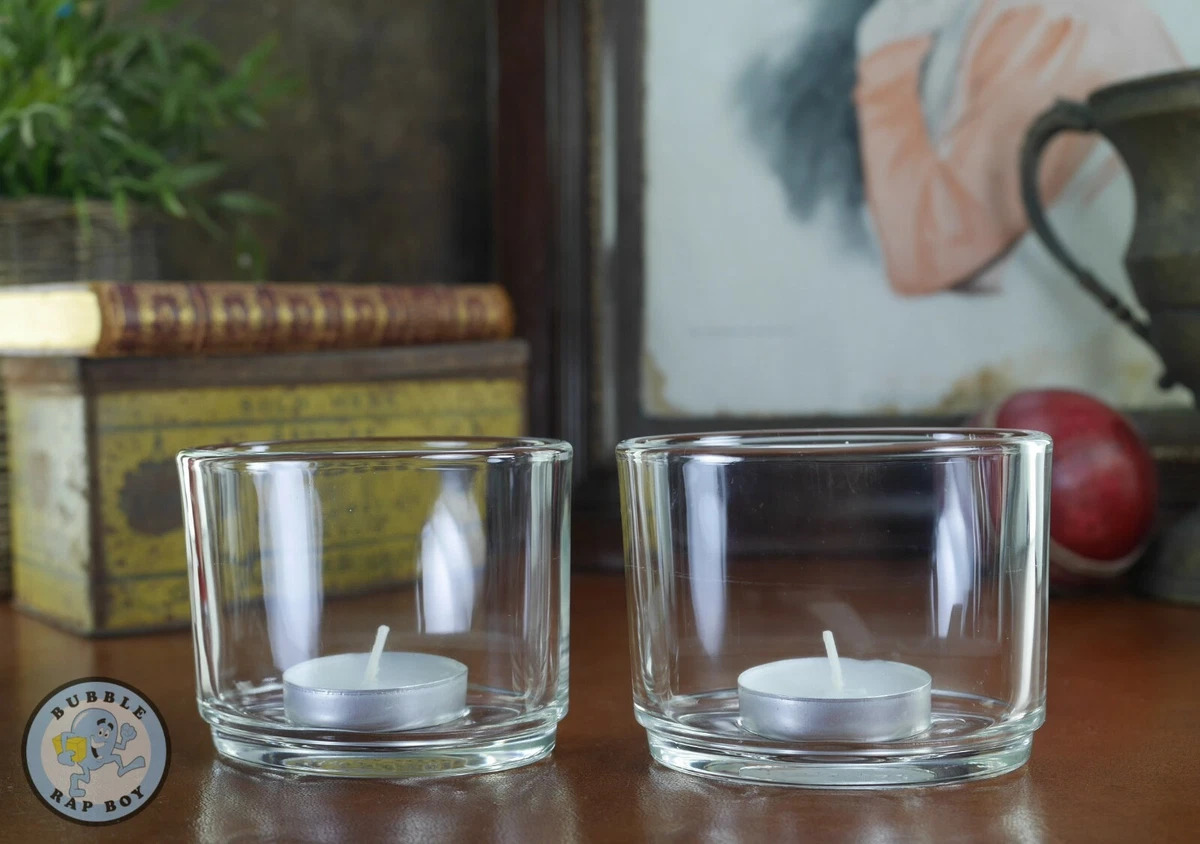 A PAIR OF HABITAT CLEAR GLASS TEA LIGHT HOLDERS