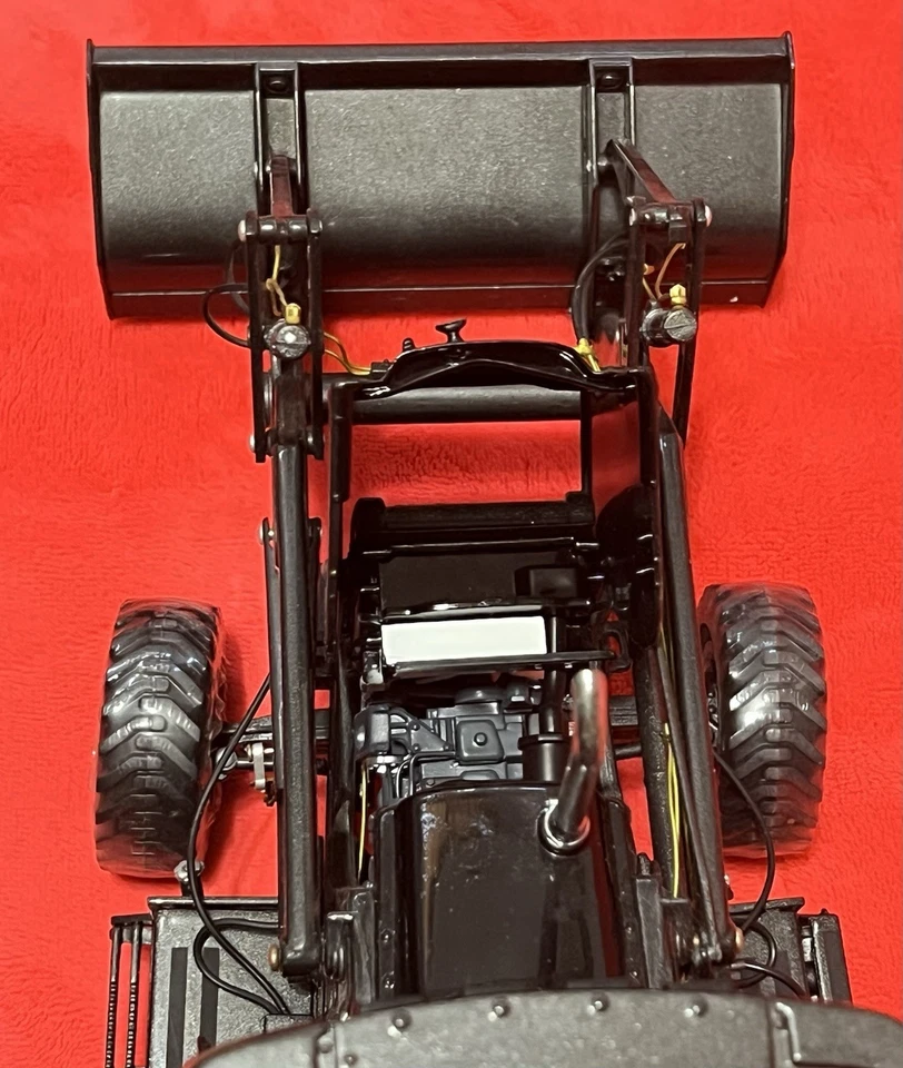 Retroexcavadora ERTL Case 580 Super M Series 2 Cargadora Negra 50 Aniversario 1/16 Nueva en Caja Foto 3 de 4