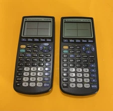 Lot of 2 Texas Instruments TI-83 Plus Graphing Calculators. W/ covers Working