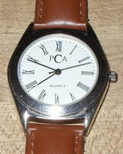 PCA UNISEX QUARTZ WRISTWATCH, NEW BATTERY