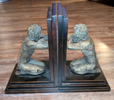 Vintage Echo Myth Reverie Kneeling Man looking in mirror on wooden base bookends