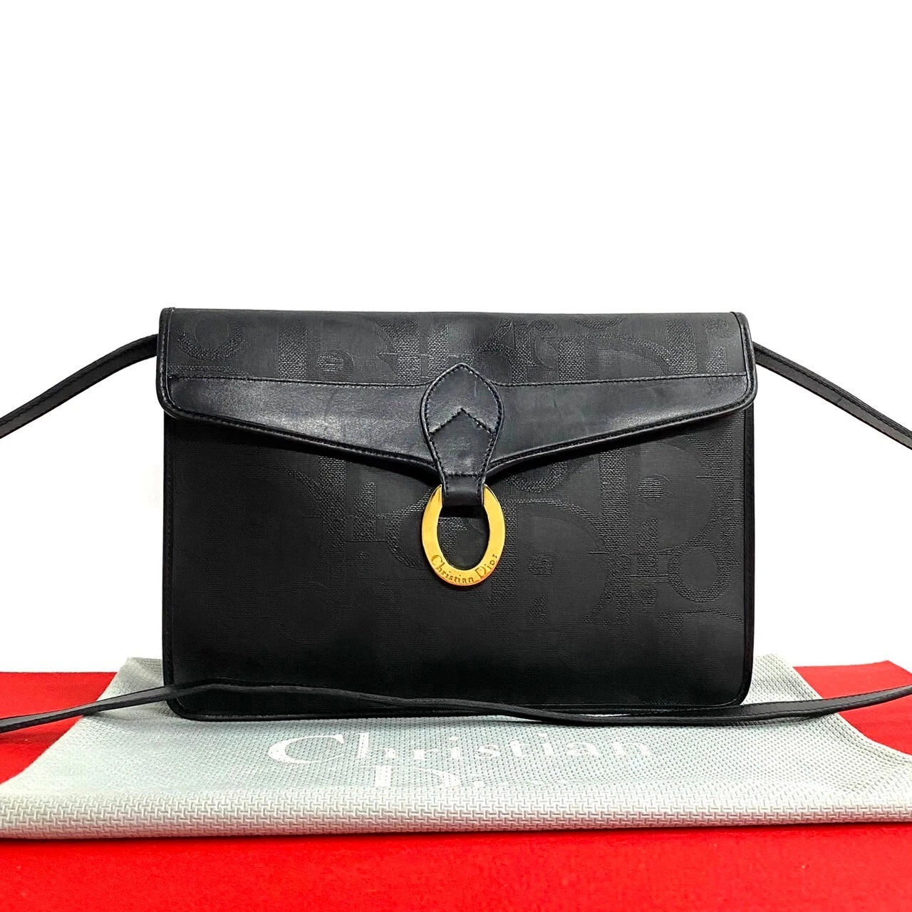 Sac bandoulière Christian Dior logo métal motif trotteur cuir PVC noir 66229