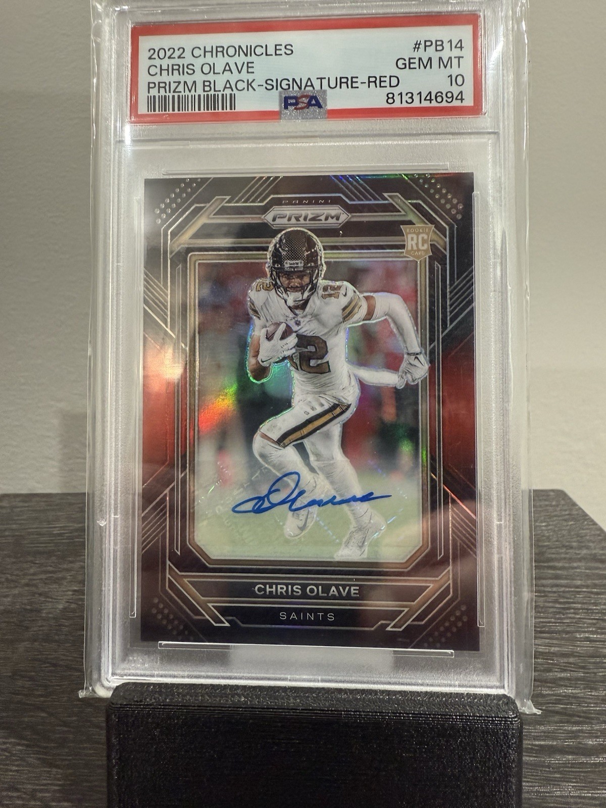 2022 Panini Chronicles - Prizm Black Chris Olave #PB-14 Red /99 (RC)