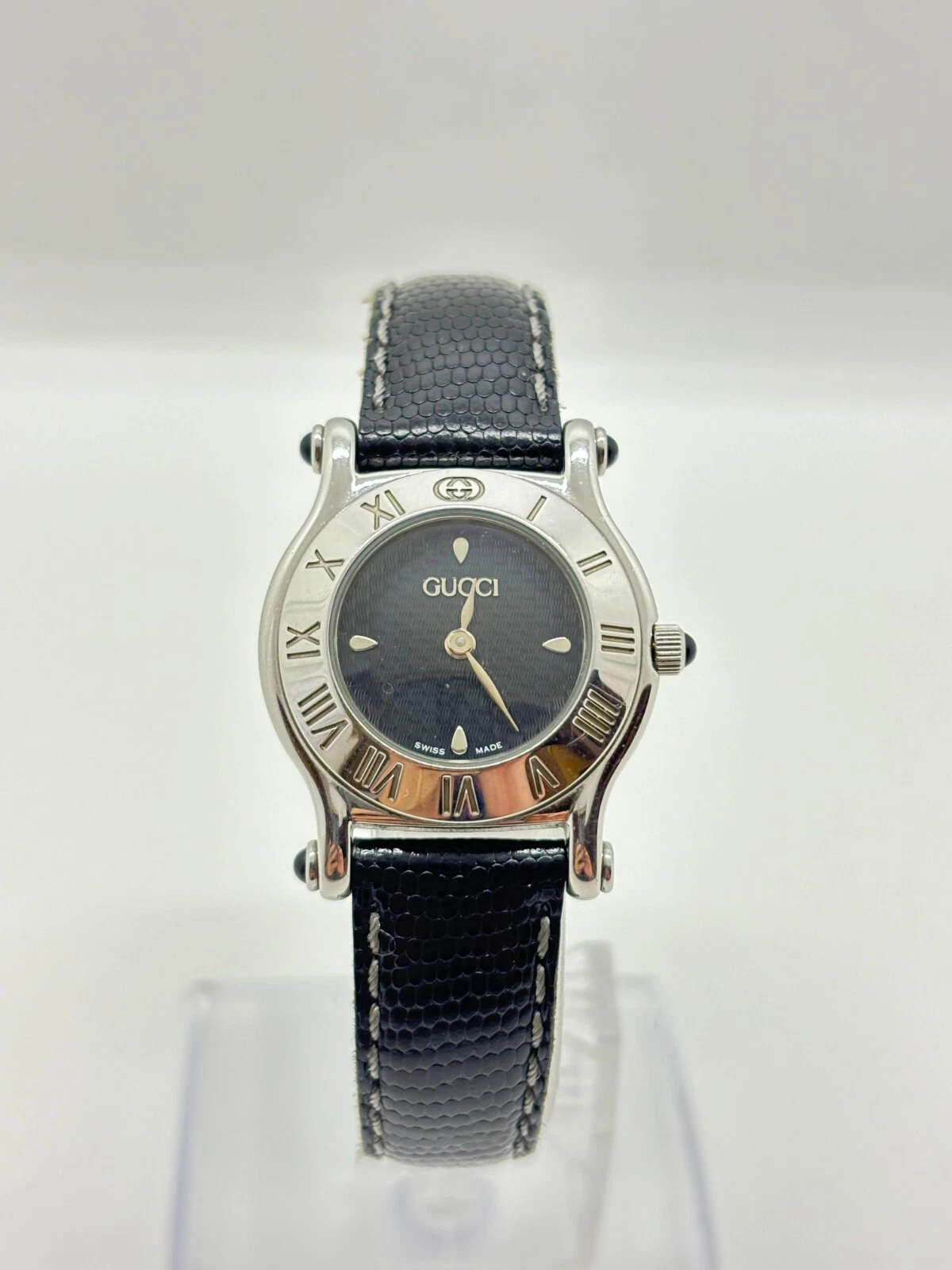 [Exc+5] Montre femme GUCCI 6500L cadran noir argent quartz fabrication suisse fonctionne