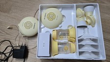 Tiralatte doppio Medela Swing Maxi Flex + 2. Unità motore + alimentatore/adattatore auto