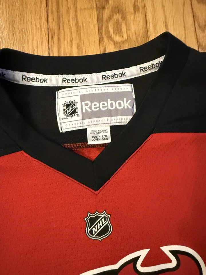 Camiseta deportiva de hockey Zach Parise #9 New Jersey Devils Reebok NHL (talla juvenil L/XL) Foto 4 de 4